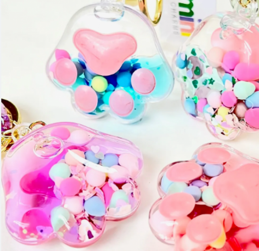 PAW FLOAT 3D CHARM KEYCHAIN